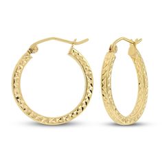 These beautiful hoop earrings for her are crafted in iconic 14K yellow gold and showcase a beautiful diamond cut finish. The textured hoops measure 20mm and secure with hinged clasps. Anniversary Yellow Gold Hinged Hoop Earrings, Formal Textured Yellow Gold Jewelry, 14k Gold Small Hoop Hinged Jewelry, Small Hoop Hinged 14k Gold Jewelry, 14k Gold Diamond Cut Hoop Earrings For Anniversary, Small Hoop Engraved Yellow Gold Earrings, Engraved Small Hoop Earrings In Yellow Gold, Textured 14k Yellow Gold Jewelry, Small Hoop Earrings In Yellow Gold With Diamond Cut