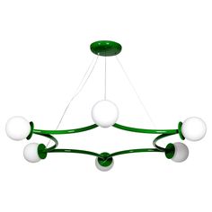 a green and white chandelier with five balls hanging from the center, on an isolated white background