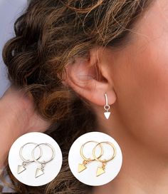 Enjoy our minimalist Gold and Silver Heart charm earrings. They are small but enough to attract people's attention. They go very well with any dress or blouse. They are minimal and cute !  M A T E R I A L S * A N D * D E T A I L S  We use the highest quality materials:  - 14K Gold filled hoops - Sterling Silver Hoops - Sterling Silver Heart charms - 14K gold plated over sterling silver charms D I M E N T I O N S  X-Small (9 mm), Small (12 mm) and Medium (14 mm) diameter hoops  8x6 mm Heart Charm H O W * T O * O R D E R  Select Earrings Color from the first drop down menu.  Choose X-Small (9 mm), Small (12 mm) or Medium (14 mm) diameter hoops from the second drop down menu.  Select quantity of pair hoops from the third drop down menu. M O R E * E A R R I N G * C H O I C E S 1. Sterling Silv Minimalist Hoop Earrings With Charms For Everyday, Minimalist Everyday Hoop Earrings With Charms, Hoop Earrings With Charms As Gift, Charm Hoop Earrings As Gift, Everyday Hoop Earrings With Charms, Trendy Small Hoop Earrings With Dangling Charms, Minimalist Small Hoop Huggie Earrings With Dangling Charms, Trendy Small Hoop Earrings With Charms, Small Hoop Earrings With Dangling Charms