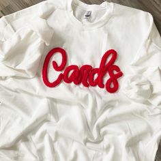 Cardinals Pullover embroidered with chenille White with Red Chenille *We use only the highest quality Heavy Blend Gildan Unisex Sweatshirts Laundering: wash inside out and line dry for best results. Oversized White Sweatshirt With Letter Embroidery, Oversized Embroidered White Sweater, White Crew Neck Sweater With Letter Embroidery, Oversized College Sweater With Letter Embroidery, Oversized Letter Embroidery Sweater For College, Red Embroidered Crew Neck Sweater, Oversized Crew Sweater With Letter Embroidery, Oversized Crew Neck Sweater With Letter Embroidery, White Winter Top With Embroidered Text