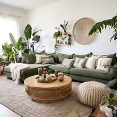 a living room filled with lots of green furniture