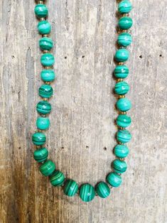 Gorgeous green Malachite beads, matched and graduated in size, and interspersed with amber colored glass Trade beads is definitely a statement piece!  These vintage African beads range from 1/4 to 1/2 inch in size and tiny yellow glass Trade beads frame the larger Malachite beads.  This stunning 24" necklace is finished with a barrel clasp and looks fabulous solo or with a group of necklaces. This vintage piece will be gift wrapped for wearing or giving. 🎁 Please Convo me with any questions and Bead Frame, Green Malachite, African Beads, Trade Beads, Amber Color, Bead Necklace, Colored Glass, Statement Pieces, Necklace Etsy