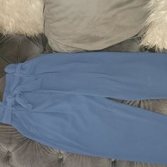 Size 2 Brand New Haigh Waisted Trouser Color Blue Front Zip With Metal Clasps Polyester Material Elegant Blue Bottoms For Brunch, Blue Tie Waist Bottoms For Spring, Blue Bottoms With Tie Waist For Spring, Chic Blue Bottoms For Date Night, Chic Light Blue Pants For Day Out, Blue Tie-waist Bottoms For Day Out, Blue Bottoms With Tie Waist For Day Out, Blue Party Pants With Pockets, H&m Party Bottoms For Summer