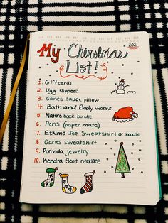 a christmas list is shown on top of a black and white checkered blanket