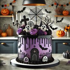 a decorated halloween cake with candles and decorations