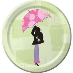 a paper plate with a woman holding an umbrella