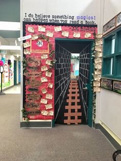 an entrance to a book store that is decorated with books and paper machs on the walls