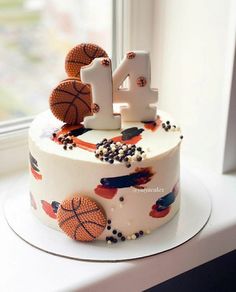 a decorated birthday cake sitting on top of a window sill