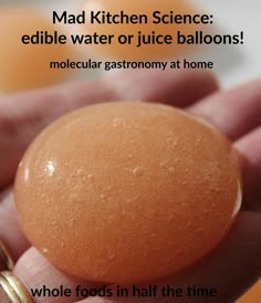 a person holding an egg in their hand with the caption mad kitchen science edible water or juice balloons