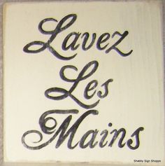 a sign that says lavex les mains on it