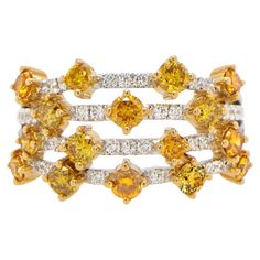 It comes with the appraisal by GIA GG/AJP 16 Fancy Yellow Diamonds = 1.25 Carats 38 White Diamonds = 0.30 Carats Origin: Natural, Cut: Round Metal: 18K White and Yellow Gold Ring Size: 7* US *It can be resized complimentary Multi Band Ring, Yellow Diamonds, Gold For Sale, Fancy Yellow Diamond, Bracelet Love, White Diamond Ring, Diamond Cocktail Rings, Modern Ring, Rough Diamond