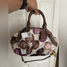 Never Used Coach Hand Bag. Designer Purple Travel Bag, Designer Purple Shoulder Bag With Detachable Handle, Designer Purple Double Handle Shoulder Bag, Designer Purple Bags With Handles, Designer Purple Shoulder Bag With Removable Pouch, Designer Purple Shoulder Bag With Handles, Purple Designer Shoulder Bag, Chic Purple Shoulder Bag With Handle Drop, Purple Satchel Shoulder Bag With Handle Drop