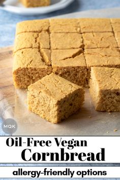 oil free vegan cornbread is cut into squares and placed on a cutting board