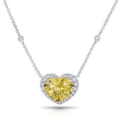 12.31 CT Heart Shaped Yellow Sapphire with round brilliant cut diamonds 1.17 carats set in handmade platinum pendant. Luxury White Gold Heart Cut Diamond Necklace, Luxury Diamond White Heart Cut Diamond Necklace, Fine Jewelry Heart Necklace With Round Cut Cubic Zirconia, Luxury White Gold Heart Necklace With Brilliant Cut, Luxury Diamond White Diamond Heart Necklace, Luxury Diamond White Heart Diamond Necklace, Luxury Heart-shaped Brilliant Cut Diamond Necklace, Luxury Diamond White Heart Necklace With Diamonds, Brilliant Cut Cubic Zirconia Heart Pendant Necklace