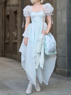 TAVIMART - Women Puff Sleeve Swing Mini Fairy Cake Robe Sweet Princess Cross Rope Bow Front Irregular Ball Gown Midi Organza Dress Available Size: S, M , L S --- Bust: 82cm , the longest Length: 133cm , Sleeve: 29cm, Waist: 62cm M --- Bust: 86cm , the longest Length: 134cm ,Sleeve: 30cm, Waist: 66cm L --- Bust: 90cm , the longest Length: 135cm , Sleeve: 31cm, Waist: 70cm 1 inches=2.54cm The size is measured by hand, measurement allow 1-3 cm Error please. Organza Midi Dress, Long Sleeve Jersey Dress, Vintage Shirt Dress, Fairy Cake, Short Sleeve Summer Dresses, Organza Dress, Summer Maxi, Elegant Chic, Mermaid Dress