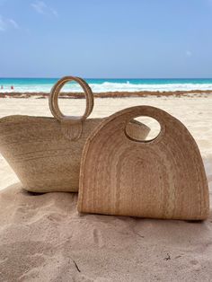 Customization with your logo, color, and sizes available. Large capacity and spacious Made from 100% Palm fibers Soft and easy to roll-fold Hand-woven in Mexico Size:15*16*4.5 in/ 38*42*11 cm Package includes: 1 beach bag The bag is made of natural straw and crafted manually, which generally can carry woven details, color shades, tassels, and size variations due to the handmade process. Please allow the magic of the handmade to take life. Palm Leaf Tote Beach Bag For Market, Palm Leaf Tote Beach Bag, Palm Leaf Bag For Beach Season Market, Palm Leaf Bag For Beach Season And Market, Natural Color Basket Beach Bag For Vacation, Natural Color Bucket Beach Bag For Vacation, Beach Season Market Bag Made Of Palm Leaf, Natural Palm Leaf Beach Bag For Beach Season, Natural Palm Leaf Beach Bag