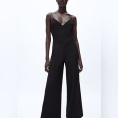 Genuine Zara New With Tag Material: 96% Polyester, 4% Elastane Color: Black Simple & Chic Long Jumpsuit. V Neckline & Wide Leg Makes It Comfortable Yet Very Fashionable. Wear On Own Or Layer With Over Shirt Elegant Spaghetti Strap Jumpsuits And Rompers For Spring, Sleeveless Fitted Pantsuit By Zara, Sleeveless Formal Jumpsuits And Rompers By Zara, Sleek Summer Jumpsuits And Rompers For Formal Occasions, Spring Evening Jumpsuits And Rompers With Spaghetti Straps, Sleek Formal Jumpsuits And Rompers For Summer, Sleek Summer Formal Jumpsuits And Rompers, Spring Evening Jumpsuit With Spaghetti Straps, Elegant Summer Jumpsuits And Rompers With Adjustable Straps