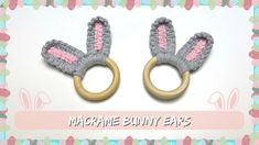 two crocheted bunny ears are shown in front of a pink and blue frame