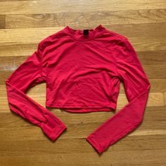 Never Worn, Perfect Condition! Trendy Red Stretch Tops, Trendy Stretch Red Tops, Red Long Sleeve Stretch Crop Top, Red Stretch Long Sleeve Crop Top, Fitted Red Long Sleeve Crop Top, Trendy Red Cropped Top, Basic Red Crew Neck Crop Top, Trendy Fitted Red Tops, Stretch Red Top For Spring