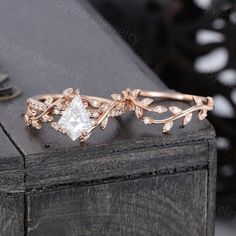 a close up of a ring on top of a wooden table