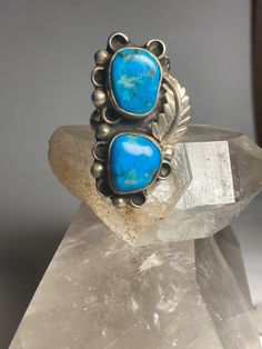 "Long Turquoise ring Navajo southwest sterling silver women Size 8.25 Weight 10.7g Length. 1 1/2\" Width 7/8\" Thinnest part of the band in back 5/32\" Free Shipping & Free Postal Insurance Delivered in a Gift Box If you do not want the ring polished and want to leave the natural patina please let me know at the time of purchase as I do polish rings before I ship rings out. Thanks Free First Class shipping and postal insurance is included. If you want to upgrade to priority kindly pay an add Collectible Western Style Turquoise Ring Stamped 925, Collectible Southwestern Turquoise Ring Stamped 925, Southwestern Turquoise Ring, Moonstone Ring, Sterling Silver Bands, Silver Band, Stone Rings, Turquoise Ring, Turquoise Bracelet