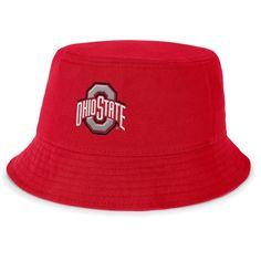 Complete your Ohio State Buckeyes game day look with this Local Apex Bucket Hat from Nike. This stylish bucket hat offers a classic look with a wraparound brim that provides 360 degrees of coverage from the sun. Made from durable twill fabric, this hat is built to last and withstand everyday wear. Show your Buckeye pride with the prominently embroidered team logo on the front and team motto on the back. Collegiate Cotton Hat With Flat Brim, Collegiate Cotton Flat Brim Hat, Collegiate Style Cotton Hat With Flat Brim, Nike Adjustable Cotton Hat, Adjustable Nike Cotton Hat, Adjustable Cotton Nike Hat, Adjustable Visor Hat For Fan Gear, Adjustable Visor For Fan Gear, Adjustable Flat Brim Sports Fan Hat