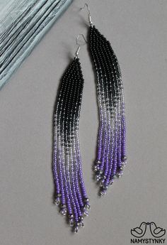 These silver purple beaded earrings with crystals are made of high-quality Czech beads and strong synthetic thread. They are elegant, fashionable, and highly versatile, suitable for everyday wear. Features: Sterling silver components Color: black, silver, purple. This item is currently in stock. You must be completely satisfied. If you find merchandise unsatisfactory for any reason, return it within 10 days and your money will be refunded without questions. More beaded earrings http://etsy.me/2y Purple Beaded Fringe Drop Earrings, Purple Tassel Drop Earrings With Dangling Beads, Purple Earrings With Beaded Fringe, Purple Jewelry With Beaded Fringe And Round Beads, Purple Beaded Fringe Dangle Tassel Earrings, Purple Beaded Fringe Tassel Earrings, Purple Beaded Dangle Tassel Earrings, Purple Beaded Dangle Earrings With Black Beads, Purple Dangle Beaded Earrings With Black Beads