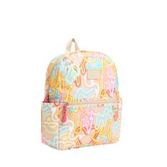 Our best selling bag for the little learner and jet-setter in your life. Designed to mix and match with our best-selling luggage, featuring a handy luggage sleeve in the back, this backpack is the perfect companion for school, family vacations, and beyond. AGE Ages: 4-8 Grades: K- 3rd SIZE 15.13" H x 11.6" W x 5.11" D Weight: 1.32 lbs Capacity: 14.69 L MATERIALS Main Body: 100% Polyester Interior Lining: 100% Recycled Polyester Spot clean with a damp cloth Girl Gift Set, Diaper Bag Tote, Misha And Puff, Accessories Packing, Belt Purse, Jet Setter, Tiny Cottons, Family Vacations, Diaper Bag Backpack