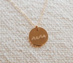 The perfect gift for Mom to remind her how important she is in your life.Product DetailsCharm comes in either gold-filled chain or sterling silver chainChain can be adjusted to 16 or 18 inchesMama charm measures 1/2 inches in diameterHand stamped2 inch necklace extenders can be purchased separatelyEver Aster inspires meaningful connections by spreading hope and simplicity through its jewelry. These pieces are the perfect gift to convey a heartfelt message to your loved one that shines with thoug Script Necklace, Necklace Extender, Meaningful Connections, Perfect Gift For Mom, Gold Filled Chain, Gift For Mom, Sterling Silver Chains, Hand Stamped, Silver Chain