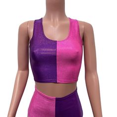 The perfect rave outfit that includes our high-waisted hot pants and crop tank in purple and pink sparkle spandex. Fitted Purple Tank Top For Night Out, Purple Sleeveless Crop Top For Night Out, Sleeveless Purple Crop Top For Night Out, Purple Sleeveless Club Top, Purple Fitted Crop Top For Club, Purple Crop Top For Night Out, Fitted Purple Crop Top For Club, Purple Fitted Crop Top For Workout, Fitted Purple Crop Top For Workout