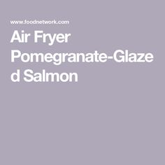 the words air fryer pomegranate - glaze d salmon on a gray background