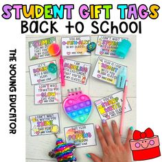 the back to school student gift tags are displayed on a table with toys and supplies