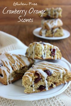 cranberry orange scones with icing on a plate