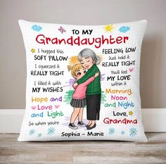 a personalized pillow with an image of two people hugging each other