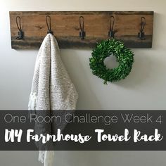 one room challenge week 4 diy farmhouse towel rack with wreath hanging on it and the words, one room challenge week 4 diy farmhouse towel rack