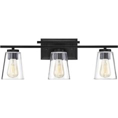 three light bathroom fixture with clear glass shades and black metal finish, on an off - white background