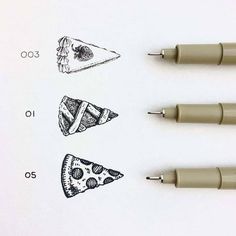 three different types of pizza on top of a sheet of paper next to some pens