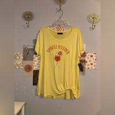 Condition: Nwt The Color Is Yellow Size Large Ptp: 20-22” Very Soft Printed Tee With A Twist Detail At The Bottom Material: 95% Rayon, 5% Spandex Feel Free To Ask Questions Happy Poshing! Soft Graphic, O Clock, Yellow Orange, Orange Yellow, Color Orange, Graphic Tee, Graphic Tees, Clock, Twist