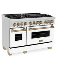 a white and gold stove with two ovens