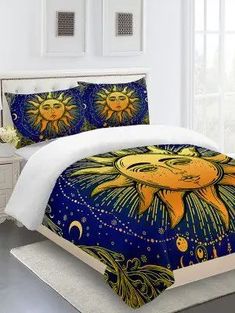 the sun and moon are depicted on this comforter set