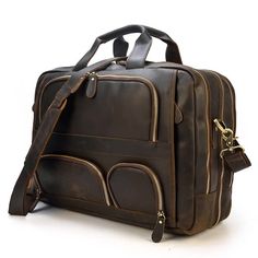 This Vintage Distressed Leather Laptop Briefcase by ULB is crafted from Full Grain Leather in a rich, dark brown color with a rugged, worn finish for a timeless look. It features multiple compartments, including two large front pockets and two smaller zippered ones, with brass zippers that contrast nicely against the leather. Sturdy leather handles ensure durability, making this briefcase a stylish and practical choice for carrying essentials. Leather Messenger Bag Men, Leather Briefcase Men, Laptop Briefcase, Luggage Bags Travel, Women Leather Backpack, Luggage Bag, Leather Laptop, Leather Messenger Bag, Leather Briefcase