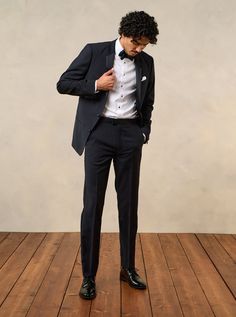 This is it: the notch lapel tuxedo you've been looking for. A modern take on the iconic tux, it looks great paired with a classic black bow tie or worn with something more unique. Do you. Includes jacket and pants. Pants are available in classic and slim fits. 100% super-fine Italian merino wool Two-button closure 100% silk satin notch lapels Side vents Fully canvassed Wool Tuxedo For Black-tie Events, Fitted Wool Tuxedo With Long Sleeves, Black Wool Tuxedo For Black Tie Events, Timeless Fitted Wool Tuxedo, Tailored Wool Tuxedo For Black-tie Events, Wool Tuxedo With Notch Lapel For Black Tie Events, Wool Tuxedo With Pressed Crease For Black-tie Events, Elegant Wool Tuxedo For Black Tie Events, Semi-formal Wool Tuxedo