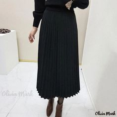 Olivia Mark - Elegant High-Waisted Solid Color Pleated Midi Skirt with Knee-Length Hem Casual Black Waist-length Skirt, Non-stretch Black Long Pleated Skirt, Black Non-stretch Long Pleated Skirt, Full-length Pleated Black Skirt, Black Full-length Skirt For Fall, Full Length Black Skirt For Fall, Black Non-stretch Pleated Skirt For Fall, Long Black Pleated Winter Skirt, Black Full Length Winter Skirt