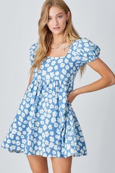 BaeVelyFlower print cute mini babydoll fit n flare dress with back cut out and back tie up. Unlined. Semi sheer. Runs small in the bodice and wide in the skirt part. Babydoll style. Color: BlueSizes: S-M-L Runs small, Bust 32-34-36, waist 28 on size small, Length 33-34 Our model is wearing size small78% Cotton, 22% Polyester, importedC3/BD5180-A Floral Babydoll Dress, Baltic Born, Sundress Dress, Babydoll Style, Spring Skirts, Denim Romper, Skirt With Pockets, Fashion Design Clothes, Fit N Flare Dress