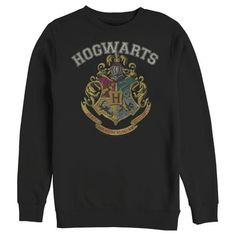 Unlock magical secrets hiding in the closet under the stairs with this officially licensed Harry Potter Vintage Hogwarts Crest Men's Black crewneck sweatshirt that features the crest for all the Hogwarts houses and "Hogwarts" printed above! Head to Hogwarts with your favorite witches and wizards like Harry, Hagrid, Dumbledore, Hermione Granger, Ron Weasley, and Neville Longbottom, and learn to defeat He Who Shall Not Be Named! And, just remember, the spell is Wing-gar-dium Levi-o-sa and NOT Wing The Hogwarts Houses, Harry Potter Sweatshirt, Neville Longbottom, Hogwarts Crest, Black Crewneck Sweatshirt, Hogwarts Houses, Black Crewneck, Ron Weasley, Hermione Granger