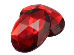 two large red stones sitting next to each other