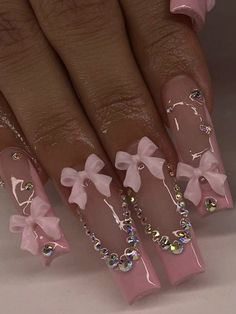 a manicure with bows and jewels on it