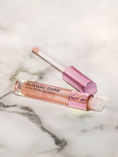 Bring the runway to your vanity.Our high-shine formula is available in a variety of sheer colors. Expressive, unique, and full of flavor—just like you.Key Ingredients, Claims & BenefitsDermatologist testedNot tested on animalsTip: Wear alone or layer on top of your favorite lip color for a megawatt finish.Details .11 oz. Made in USA Shine Lip Gloss, Victoria's Secret Fashion Show, Victoria Secret Fashion, Victoria Secret Fashion Show, Lip Color, Lip Colors, Order Online, Lip Gloss, Like You