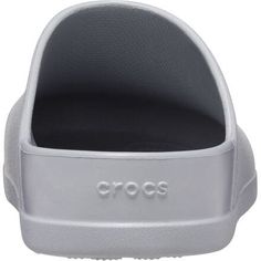 The Dylan Clog melds the classic styling of mules with the unbelievable comfort of Crocs' classic Croslite material. The soft cushioning of the footbed keeps our feet fresh for long walks along the boardwalk or hours of chores around the house and backyard. The easy slip-on style stays next to the door so we can slide them on as we head out of the house, but there's no guarantee we'll want to take them off when we get back home. Casual Synthetic Slide Slip-ons, Foam Slides With Rubber Sole And Round Toe, Foam Slides With Round Toe And Rubber Sole, Slip-on Synthetic Mules With Cushioned Footbed, Synthetic Slip-on Mules With Cushioned Footbed, Non-slip Solid Synthetic Slippers, Synthetic Slide Mules With Rubber Sole, Non-slip Synthetic Slippers, Slip-resistant Casual Clogs In Solid Color