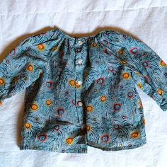 Nwot Bonpoint Baby Light Green Floral Button Down Designer Blouse Size 6 Month 100% Cotton Beautiful Designer Blouse For A Baby Girl! Retails For $215. Selling For $75 Obo. Spring Playwear Tops With Buttons, Blue Tops With Buttons For Playtime, Spring Playtime Tops With Buttons, Blue Button-up Tops For Playtime, Cute Blue Tops With Button Closure, Baby Light, Designer Blouse, Kids' Dresses, Blouse Designs